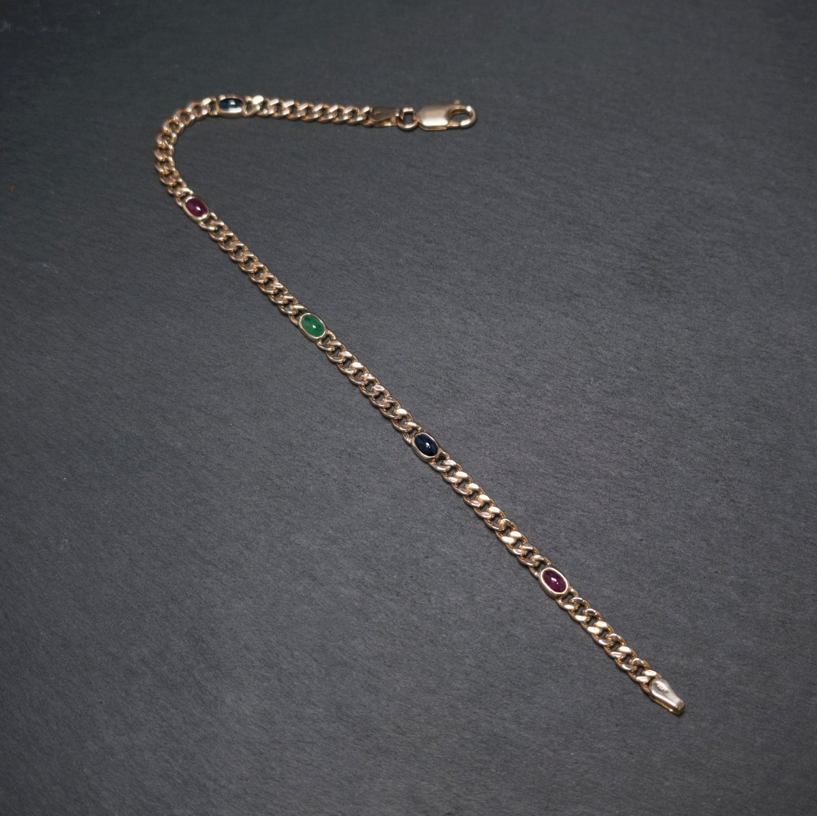 Panzerarmband 333/- Gelbgold mit 2 Saphiren 2 Rubinen und 1 Smaragd