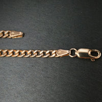 Panzerkette 333/- Gelbgold mit 2 Saphiren 2 Rubinen und 1 Smaragd