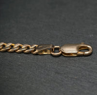 Panzerkette 333/- Gelbgold mit 2 Saphiren 2 Rubinen und 1 Smaragd