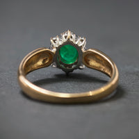Smaragdring 585/- Gelb- und Weißgold mit 1 Smaragd und 8 Diamanten