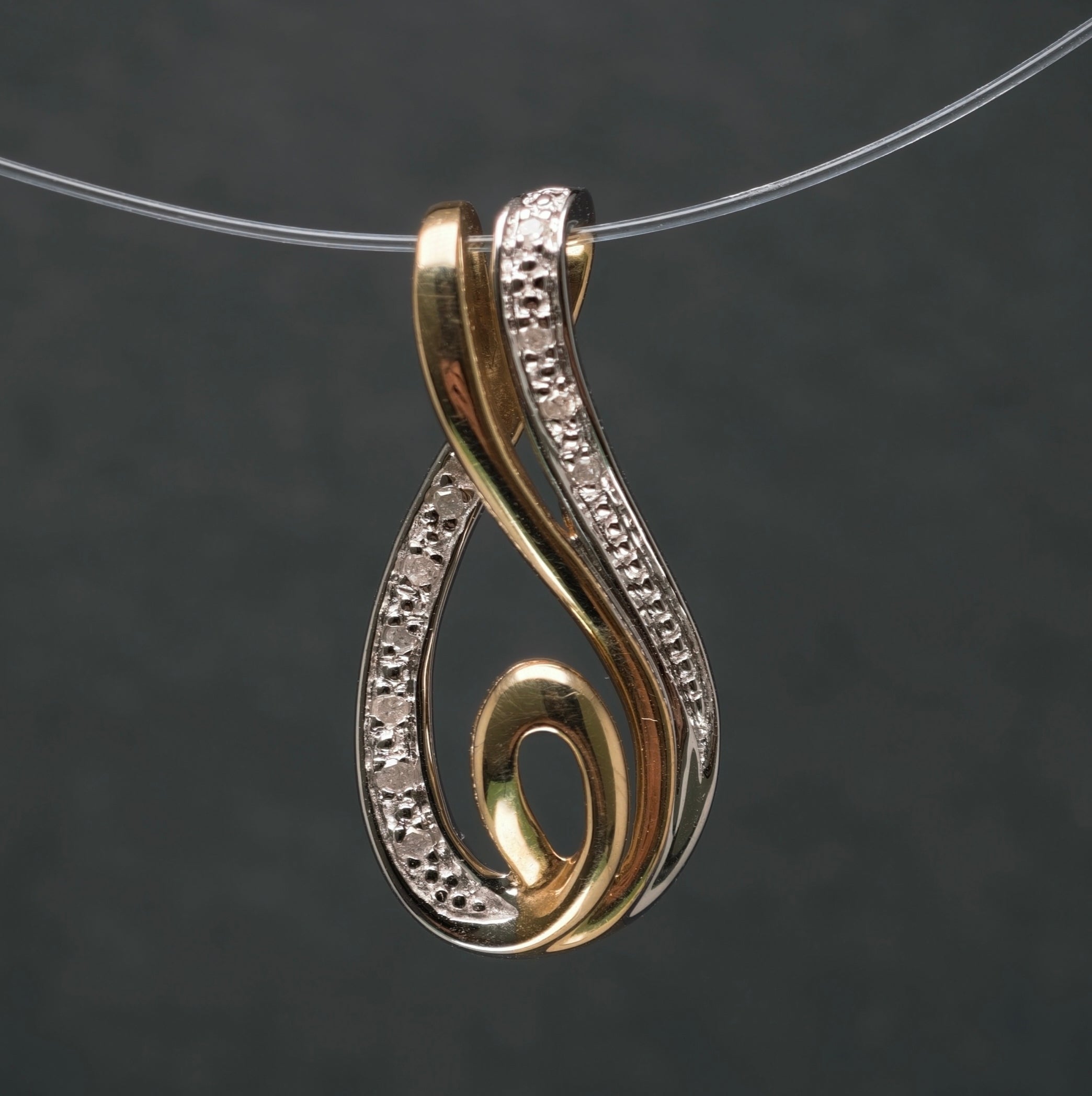 Anhänger 585/- Gelb- und Weißgold mit 10 Diamanten