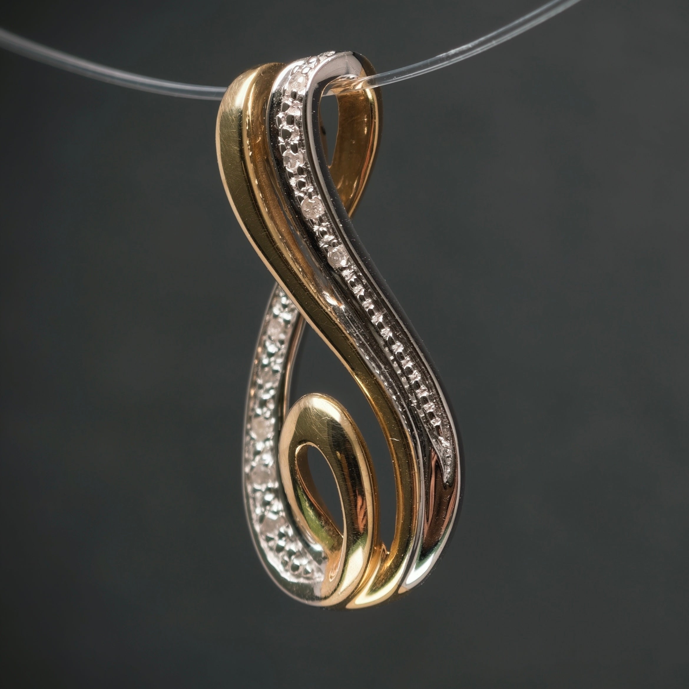 Anhänger 585/- Gelb- und Weißgold mit 10 Diamanten