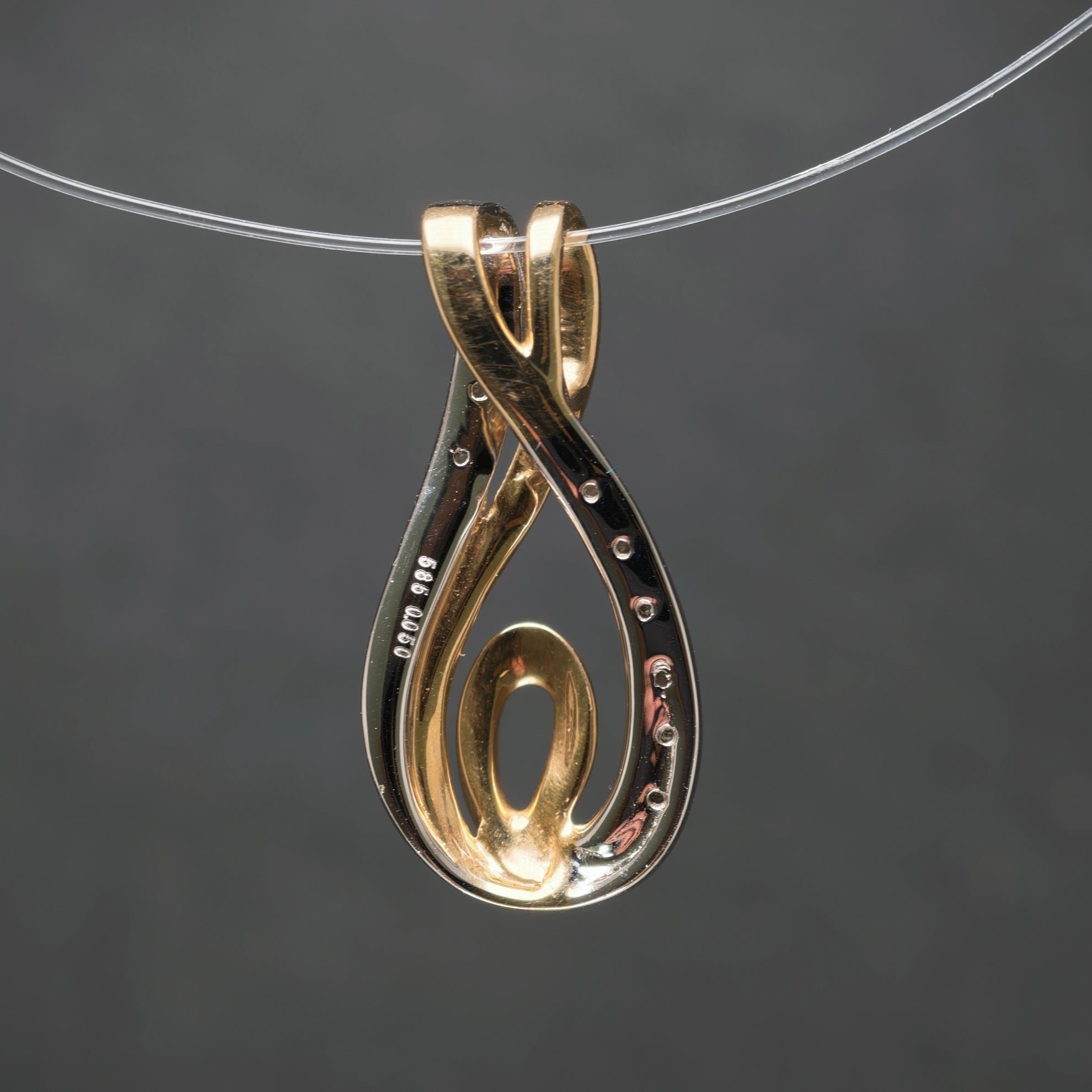 Anhänger 585/- Gelb- und Weißgold mit 10 Diamanten