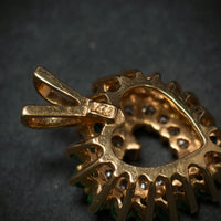 Anhänger "Herz" 585/- Gelbgold mit 14 Diamanten und 18 Smaragden