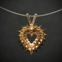 Anhänger "Herz" 585/- Gelbgold mit 14 Diamanten und 18 Smaragden