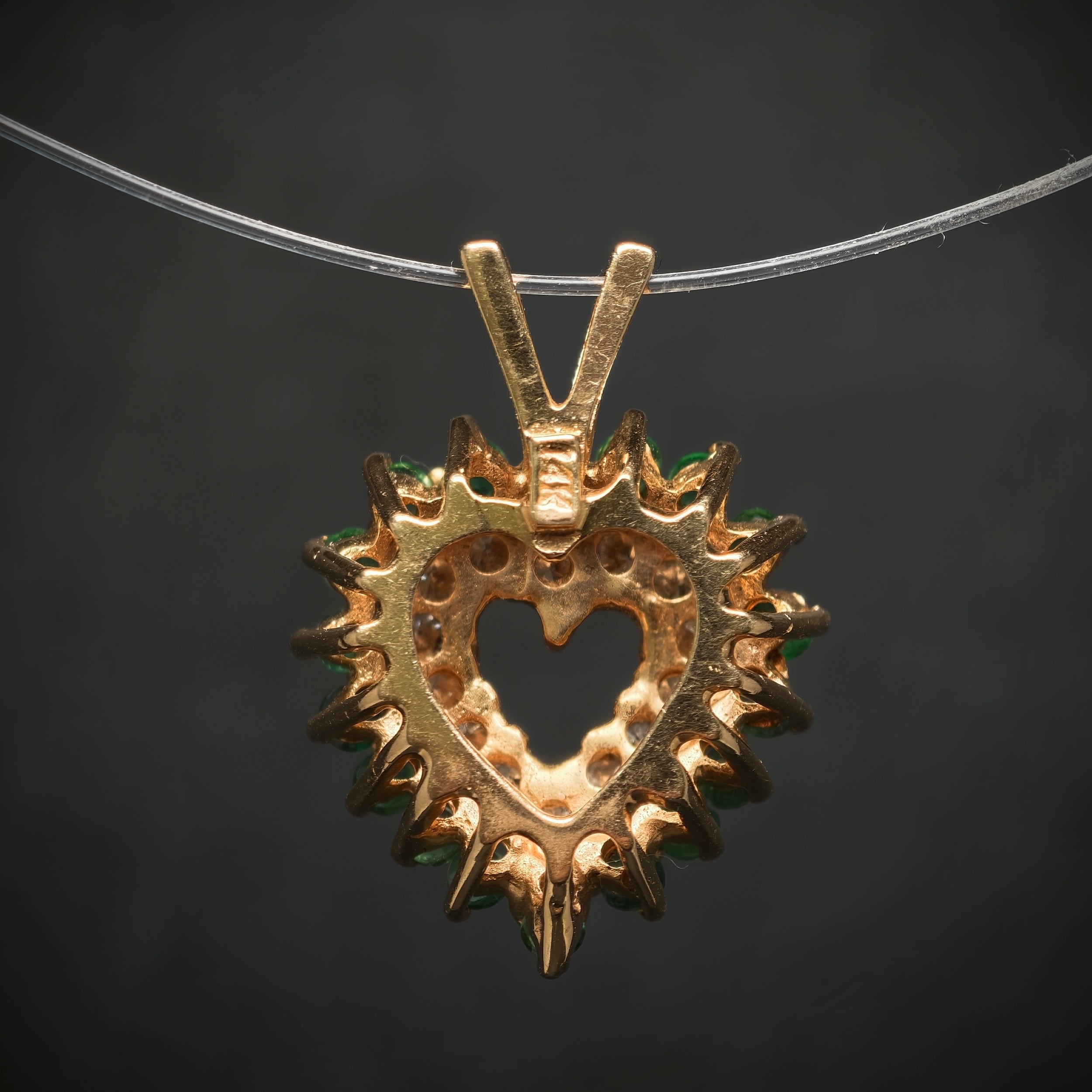Anhänger "Herz" 585/- Gelbgold mit 14 Diamanten und 18 Smaragden
