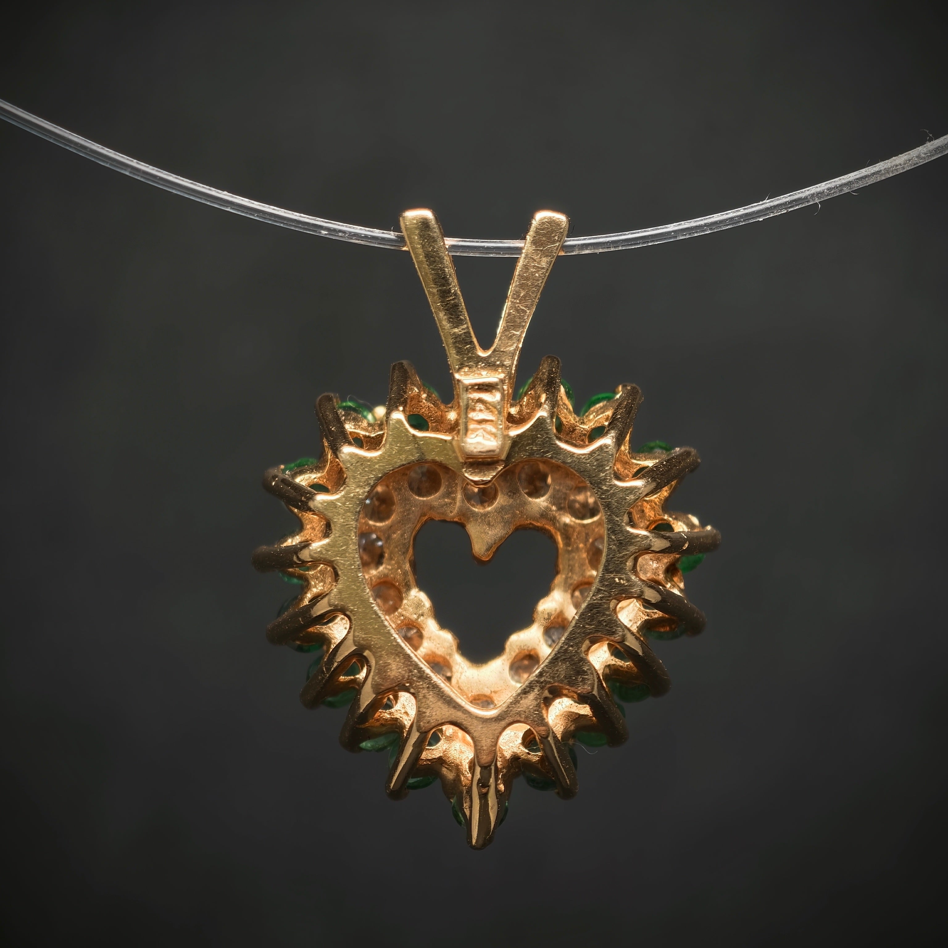 Anhänger "Herz" 585/- Gelbgold mit 14 Diamanten und 18 Smaragden