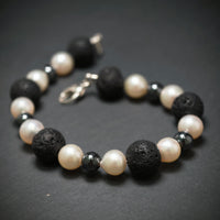 Perlarmband mit Lava und Hämatite
