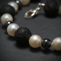 Perlarmband mit Lava und Hämatite