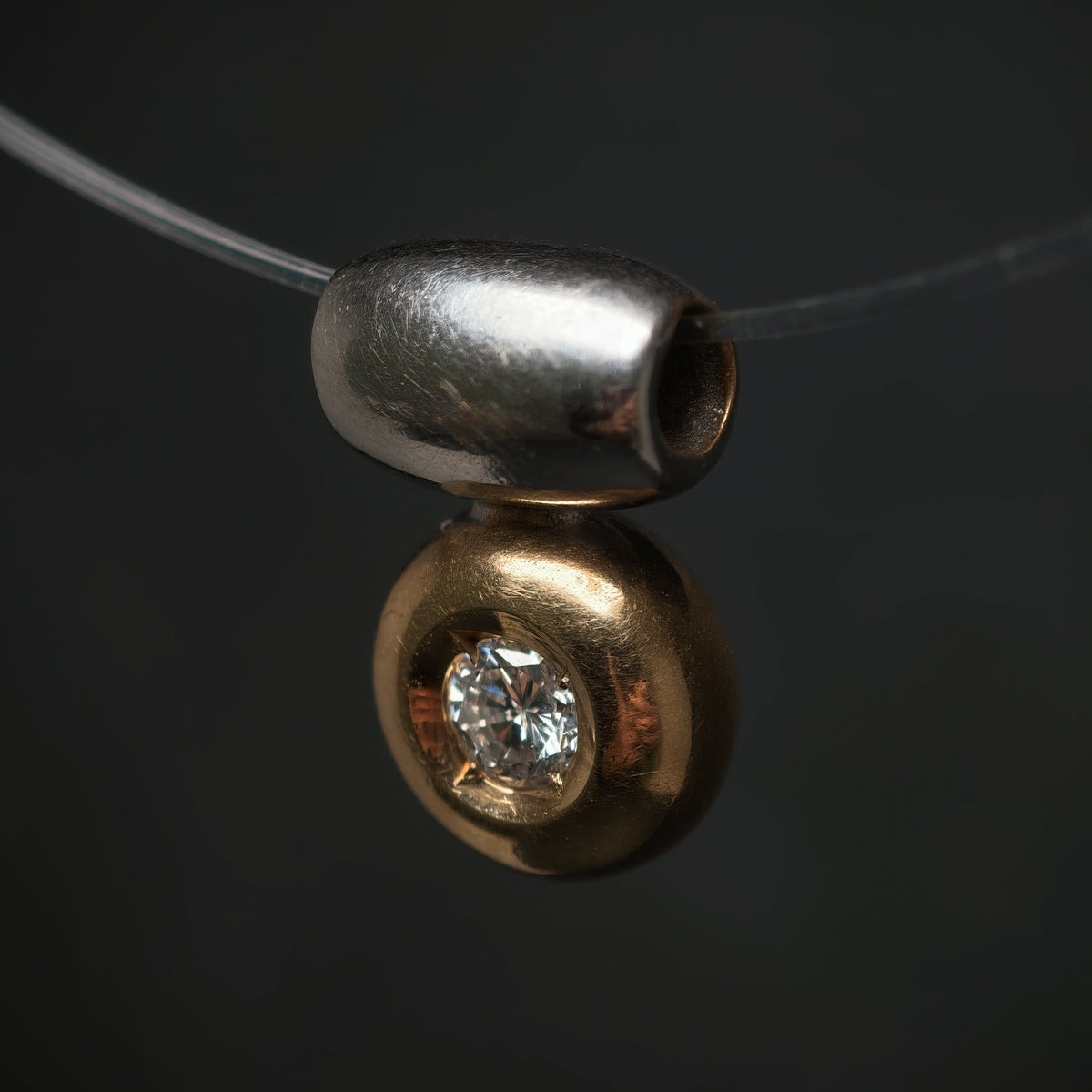 Anhänger 585/- Gelb- und Weißgold mit 1 Brillant