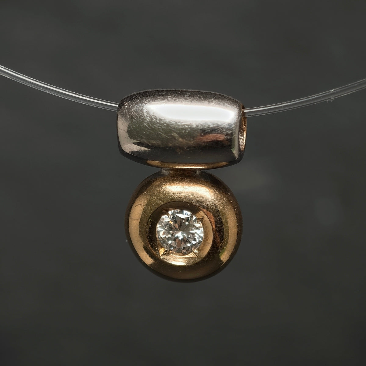Anhänger 585/- Gelb- und Weißgold mit 1 Brillant