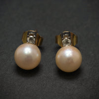 Ohrstecker 585/- Gelbgold mit 2 Diamanten und 2 Süßwasserperlen