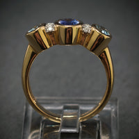 Ring 585/- Gelbgold mit 1 Tansanit 2 Blautopase und 8 Diamanten