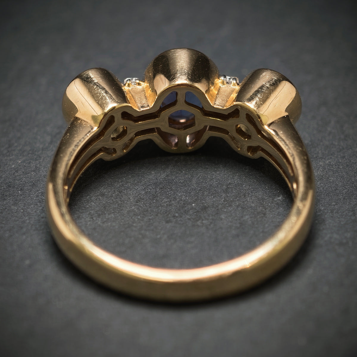 Ring 585/- Gelbgold mit 1 Tansanit 2 Blautopase und 8 Diamanten