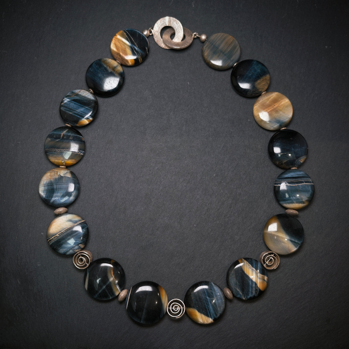 Handgefertigte Kette 925/- Silber mit 16 Falkenaugen