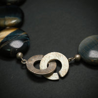 Handgefertigte Kette 925/- Silber mit 16 Falkenaugen